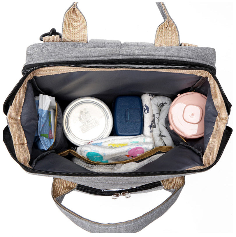 Pack Paseo Seguro: Mochila Maternal (Cuna Integrada) + Calentador USB de Regalo
