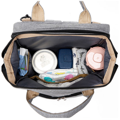 Pack Paseo Seguro: Mochila Maternal (Cuna Integrada) + Calentador USB de Regalo